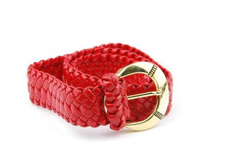 red leather belt isolated on white backgroundの写真素材