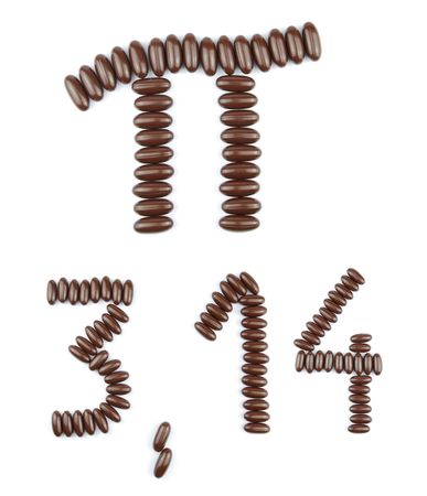 mathematical constant Pi and 3,14 with chocolate candies (isolated on white background)の写真素材