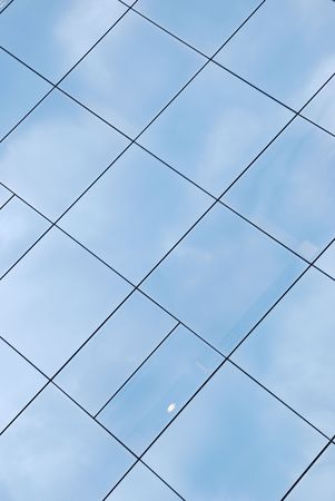 modern office building facade with glass patternの写真素材