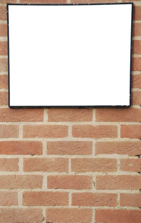 empty billboard on a beautiful brick wall buildingの写真素材