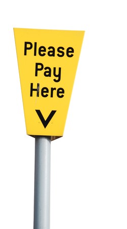 yellow please pay here car parking sign reminding customersの写真素材