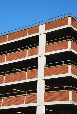 empty parking facility on a tall brick buildingの写真素材