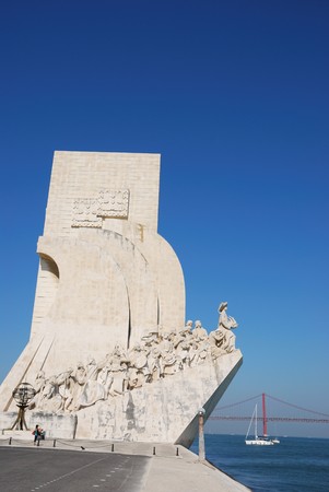 famous monument to the maritime discoveries in Lisbon, Portugal (April 25th bridge on the background)のeditorial素材