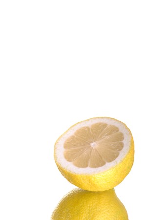 cross section of a lemon isolated on white backgroundの写真素材