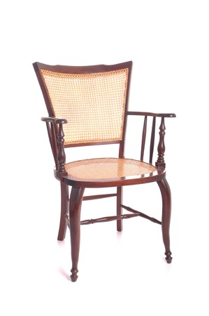 beautiful antique wooden wicker chair isolated on white backgroundの写真素材