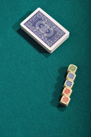 poker cards and dices on a green cloth backgroundのeditorial素材