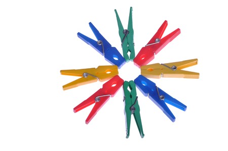 circle of colorful clothes pegs isolated on white backgroundの写真素材