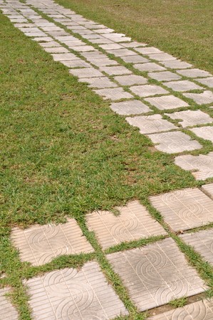 concept of success, challenge and destination (stones on a lawn park regarding phases and goals)の写真素材
