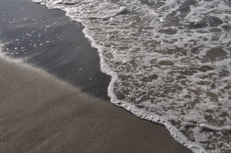 gorgeous beach sand and sea foam (copy-space available)