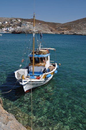 beautiful fishing boat at the bay of Pserimos island, Greeceの写真素材