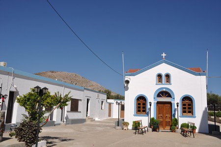 beautiful blue and white church in Pserimos island, Greece (gorgeous blue sky)の写真素材