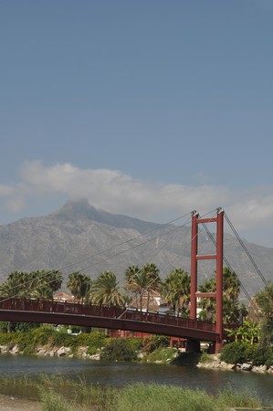 beautiful Puerto Banus bridge (reminding Golden Gate Bridge in San Francisco), Spainの写真素材
