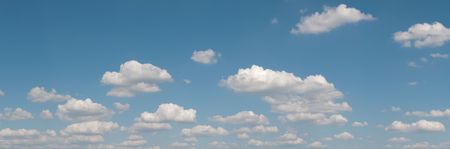gorgeous white clouds in the blue sky (panoramic picture with copy-space at left top corner)