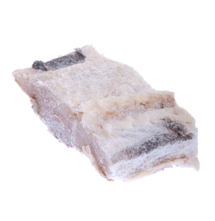 salted raw cod fish isolated on white backgroundの写真素材