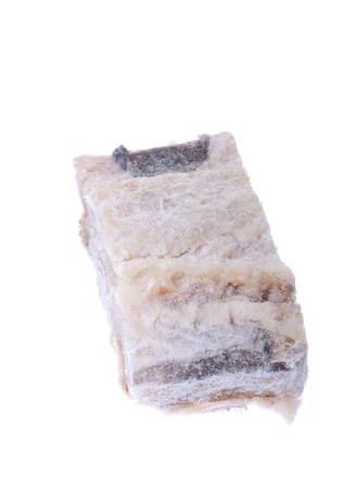 salted raw cod fish isolated on white backgroundの写真素材