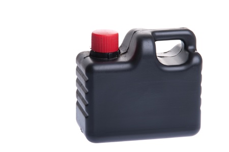 black engine oil bottle isolated on white backgroundの写真素材