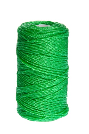 green clew of twine isolated on white background の写真素材