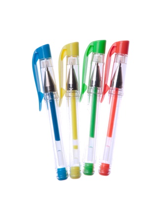 four colorful pens isolated on white backgroundの写真素材