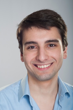 portrait of a smiling handsome trainee starting business careerの写真素材