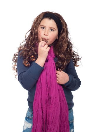 adorable little girl portrait dressed as teenager with long wig and glitter, eating an ice cream (isolated on white background)の写真素材
