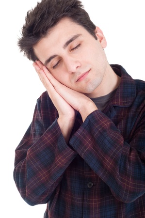 lovely young man portrait in pajamas isolated on white backgroundの写真素材