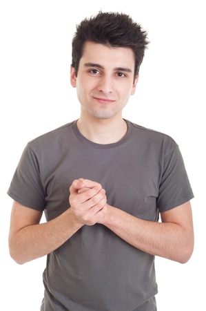 young casual man with shyness expression starting to get comfortable (isolated on white background)の写真素材