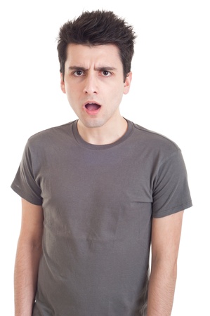 confused young casual man with what expression (isolated on white background)の写真素材