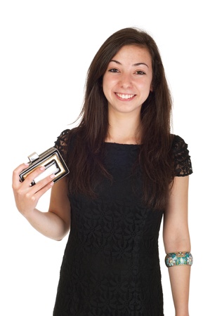 beautiful 18 years old young woman in black dress and purse ready for night out (isolated on white background)の写真素材