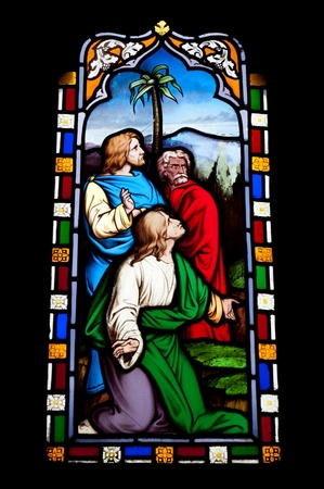 religious stained glass window in Gloucester Cathedral, England (United Kingdom) (isolated on black background)の写真素材