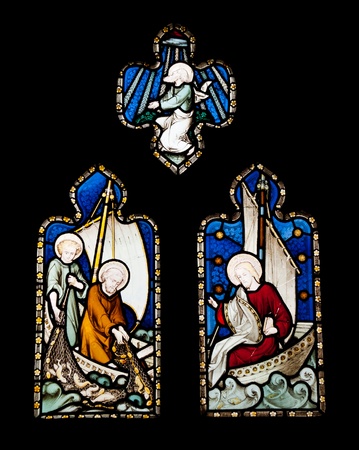religious stained glass windows in Gloucester Cathedral, England (United Kingdom) (isolated on black background)の写真素材