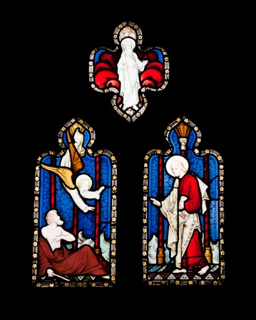 religious stained glass windows in Gloucester Cathedral, England (United Kingdom) (isolated on black background)の写真素材