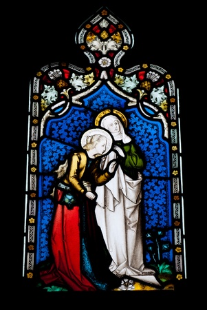 religious stained glass window in Gloucester Cathedral, England (United Kingdom) (isolated on black background)の写真素材
