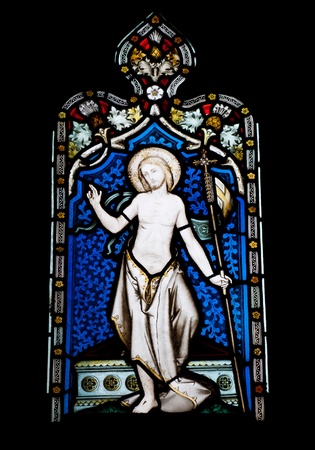 religious stained glass window in Gloucester Cathedral, England (United Kingdom) (isolated on black background)の写真素材