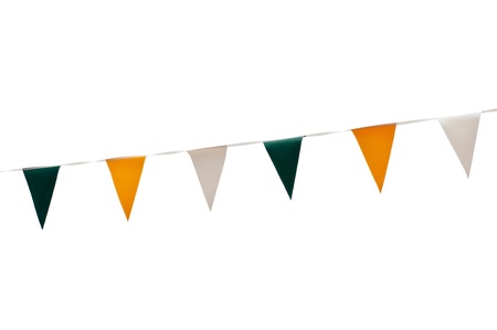 colorful festive green, yellow and white bunting flags (isolated on white background)の写真素材