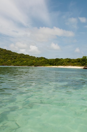 stunning deserted beach in Antigua, Caribbean (ocean view and dramatic sky)の写真素材