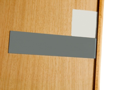 blank signs on a wooden door  isolated on white background for your design の写真素材