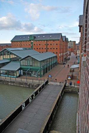 sunset picture of Gloucester docks with typical warehouse buildings, United Kingdomの写真素材
