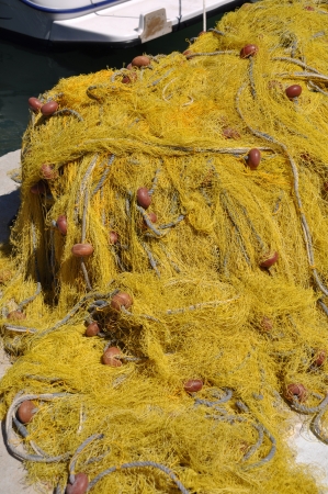 bright yellow fishing net on Kalymnos island, Greeceの写真素材
