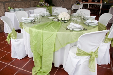gorgeous wedding chair and table setting for fine dining at outdoorsの写真素材
