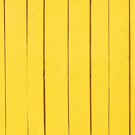 yellow wooden plank as a background or textureの写真素材