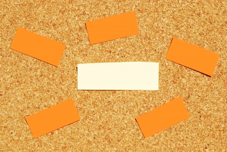 many reminder notes on a corkboardの写真素材