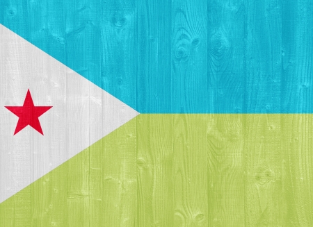 gorgeous Djibouti flag painted on a wood plank textureの写真素材