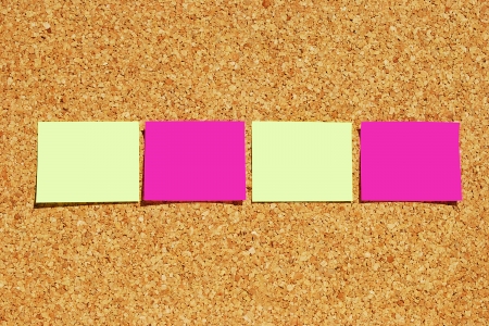 many reminder notes on a corkboardの写真素材