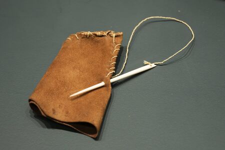 MADRID, SPAIN - OCTOBER 20, 2019: Prehistoric sewing needle. Funds from the San Isidro Museum in Madridのeditorial素材
