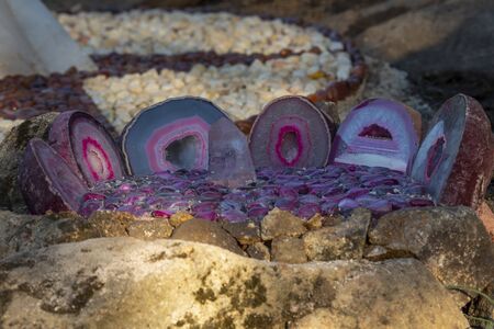 SAN MARTIN DE VALDEIGLESIAS, SPAIN - OCTOBER 20, 2019: The Enchanted Forest. Rock designs with mineralsのeditorial素材