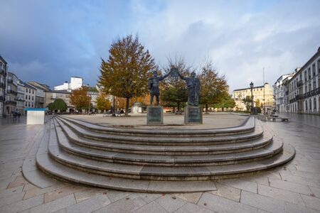 LUGO, SPAIN - OCTOBER 17, 2019: Major Square chaired by two Roman statues. They represent the founding Romans of the cityのeditorial素材