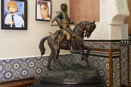 Benalmadena, SPAIN - JUNE 19, 2019: Decorative sculpture of a horse hunter. In the Bil Bil Castle, Benalmadena, Spainのeditorial素材