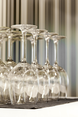 Wine glasses on a table in a restaurantの写真素材