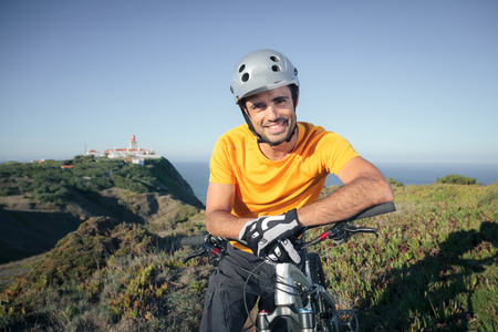 Happy mountain biker smilingの写真素材