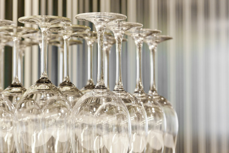 Wine glasses on a table in a restaurantの写真素材